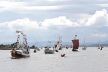 Det er over hundre kystlag i Norge som tar vare på båter og fartøy i alle størrelser. Båtene brukes til formidling av kystkultur og historie, til aktivt og sosialt kystfriluftsliv. Bildet er fra Grunnlovskonvoien 2014. Foto: Rune Alstedt